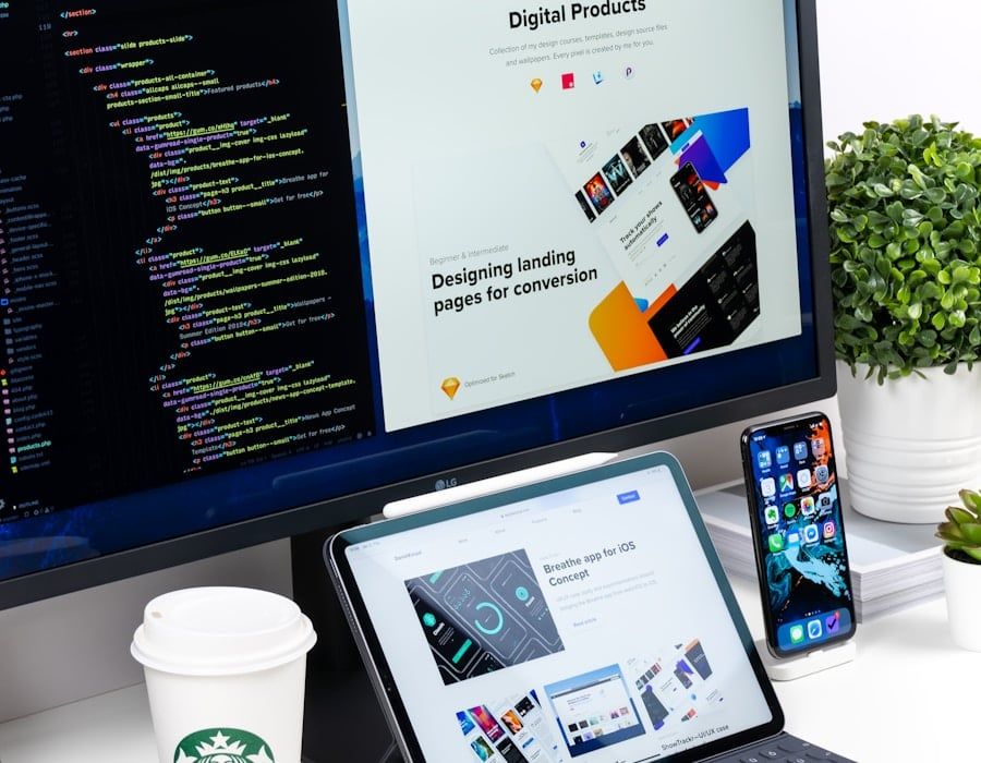 Web Design — Designer reviewing a responsive, mobile-friendly website layout on screen